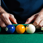 Cleaning Billiard Balls**

"Close-up of hands cleaning billiard balls with a microfiber cloth and soapy water, safe for work, appropriate content, fully clothed, professional, perfect anatomy, well-formed hands, modest setting, high quality photography, clean and bright."

**